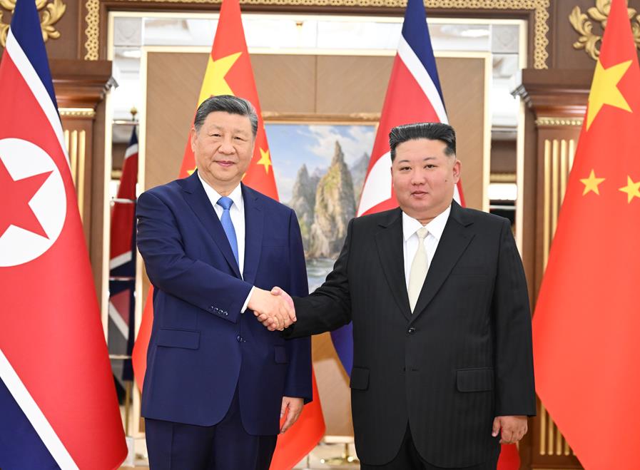 习近平同金正恩举行会谈